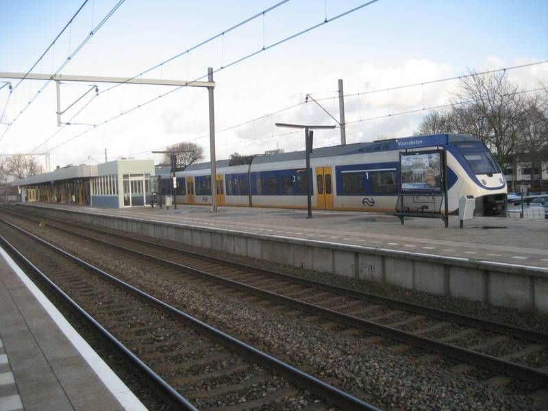 Train station Voorschoten (The Netherlands), Jan. 2014. Train passing by.