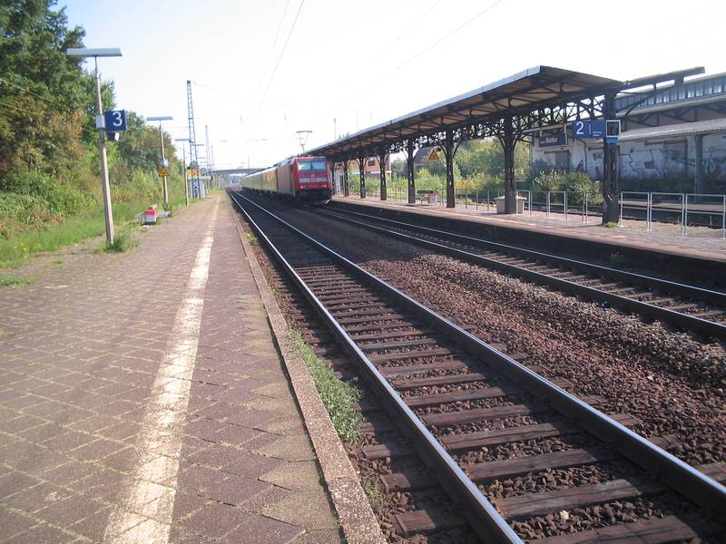 Rail station Frankfurt-Mainkur platforms with departing Regionalexpress to Würzburg