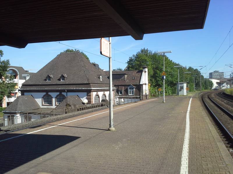 View of platform 1 and 2 at Trier-Süd station, Trier, Germany. To the left is the old train station.