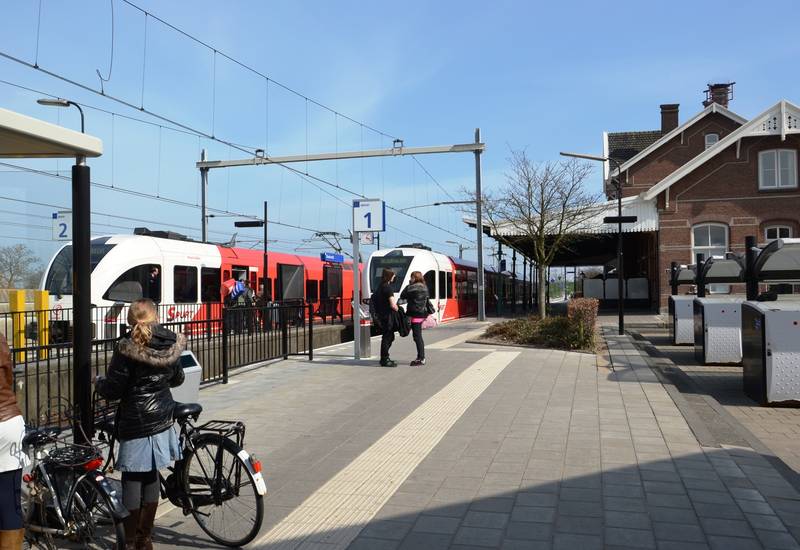 Railway station <b>Sliedrecht</b>, The Netherlands. Two trains from Arriva.