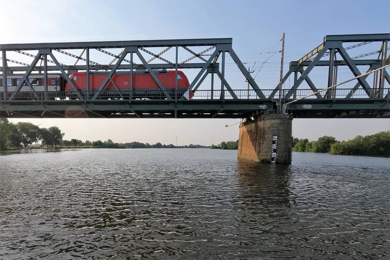 Dreye railway bridge with an EuroCity train