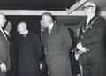 171108, Afbeelding van de aanwezigen bij de opening van het nieuwe N.S.-station Beverwijk, van links naar rechts commissaris van de Koningin in de provincie Noord-Holland dr. M.J. Prinsen, president-directeur ir. J. Lohmann van de N.S. en burgemeester J.G.S. Bruinsma van Beverwijk., Hessels, L. (Nederlandse Spoorwegen), fotograaf