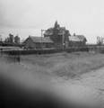 161813, Gezicht op het tijdens de oorlog beschadigde N.S.-station Oosterbeek Laag te Oosterbeek., Onbekend