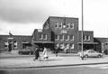 150680, Gezicht op een gedeelte van de voorgevel van het N.S.-station Sittard te Sittard., Nederlandse Spoorwegen, fotograaf