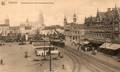 Belgique. CPA. OOSTENDE. OSTENDE. panorama de la ville à la sortie de la gare. wagons, grues.