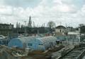 801722, Gezicht op de bouwplaats van het kantoor- en winkelcentrum Hoog Catharijne te Utrecht, tussen de Westerstraat en de Stationsstraat, met links een deel van het Centraal Station (Stationsplein, N.S.-station Utrecht C.S.)., Meijnen, W., fotograaf