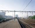 116339, Gezicht op het Centraal Station (Stationsplein) te Utrecht, uit het noordwesten, vanaf het einde van het derde perron (spoor 5/7)., Fotodienst GAU, fotograaf