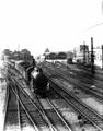 161317, Afbeelding van de stoomlocomotief nr. 2102 (serie 2100) van de N.S. met een D-trein bij vertrek uit het N.S.-station Den Haag H.S. te Den Haag., Onbekend