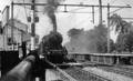 604854, Afbeelding van een trein getrokken door de stoomlocomotief nr. 3758 (serie 3700/3800) van de N.S. tijdens het passeren van het N.S.-station Driebergen-Zeist te Driebergen-Rijsenburg., Onbekend