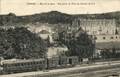 EPINAL (Vosges - Rue de la Gare - Vue prise du Pont de Chemin de Fer - Editeur : Paul Testart.