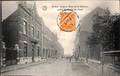 Visé - Rue de la Station prise de la rue du Pont (animée, 1919, ameublement Maison Paulus)
