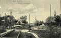 165088, Gezicht op de N.C.S.-halte Ede Gemeentehuis te Ede.