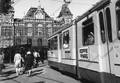 150087, Afbeelding van een tram voor het N.S.-station Amsterdam C.S. te Amsterdam., Nederlandse Spoorwegen, fotograaf