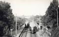 170033, Gezicht op het N.S.-station Oosterbeek Hoog te Oosterbeek, met twee elkaar kruisende stroomlijn motorrijtuigen uit de serie omBC 2901-2908 van de N.S., Onbekend