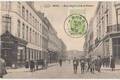 CPA BELGIQUE MONS Rues Rogier et de la Station fdu Chemin de la station de chemin de fer Commerce Maison VANDEPUTE 1912
