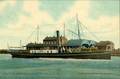 162040, Afbeelding van het stoomschip "Groningen" voor de bootdienst Enkhuizen-Stavoren in de haven van Stavoren. Op de achtergrond het H.S.M.-station Stavoren.