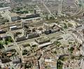 85196, Luchtfoto van het winkelcentrum Hoog Catharijne te Utrecht, uit het oosten. Links op de voorgrond de Mariaplaats, in het midden de Steenweg en rechts een deel van de Oudegracht met daarboven het Vredenburg. Links op de achtergrond het Centraal Station., Fotodienst GAU, fotograaf