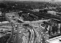 154444, Gezicht op het in aanbouw zijnde Westplein te Utrecht vanuit het zuiden met rechts de Leidseveertunnel en daarboven de noordzijde van het emplacement van het Centraal Station., Nederlandse Spoorwegen, fotograaf