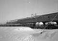 159871, Afbeelding van een goederentrein op het besneeuwde N.S.-station Utrecht C.S. te Utrecht., Nederlandse Spoorwegen, fotograaf