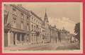 Soignies - Rue de la Station, à gauche la poste et l'école moyenne de l'état pour filles -1944 ( voir verso )