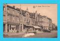 CPSM ARLON : Place de la Gare (n° 25) - Plusieurs commerces, vieilles autos , un peu abîmée - non circulée