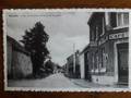 carte postale Momalle rue de la Gare et local du football