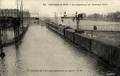 CHOISY-le-ROI - Inondations de Janvier 1910 - Le Rapide de Limoges passant en gare - Editeur : C.M. n°23.