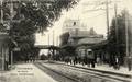 12 - COLOMBES - La Gare (vue intérieure) - Arrivée d'un train.