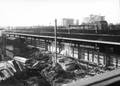 154450, Gezicht op de nieuwbouwwerkzaamheden voor het Centraal Station te Utrecht met op de achtergrond de oude perronkappen., Nederlandse Spoorwegen, fotograaf
