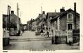 LE GENEST (Mayenne) - Rue de la gare et le passage à niveau - Editeur : Martin.